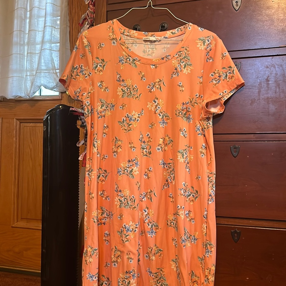 A cute spring dress, Orange and blue, yellow, and green flowers